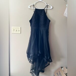 City Triangles halter style high low dress with a sheer tulle waterfall skirt.